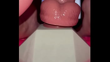 Tiny redhead rides a fence post cock