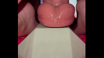 Tiny redhead rides a fence post cock