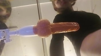 Vibrating thrusting dildo