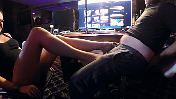 Brunette gives horny dude a footjob