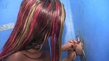 I sneak black bj as i fuck husband thrue gloryhole 2