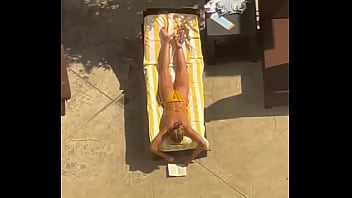 Blonde sunbathing