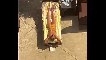 Blonde sunbathing