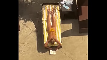 Blonde sunbathing