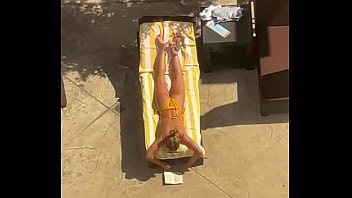 Blonde sunbathing