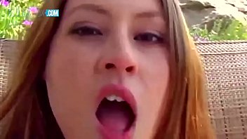 Redhead young babe wanking with vibrator