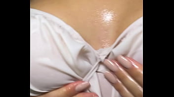 Oiled up titfuck with big slutty tits and messy cumshot