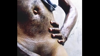 African Horny Man Getting Oiled Up Giving His Dick A Good Rub thumbnail