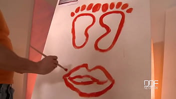 Stroked to climax by her feet