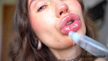 Wet messy lipgloss layers and pouting kisses