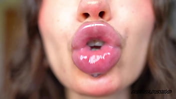 Wet messy lipgloss layers and pouting kisses