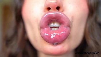 Wet messy lipgloss layers and pouting kisses