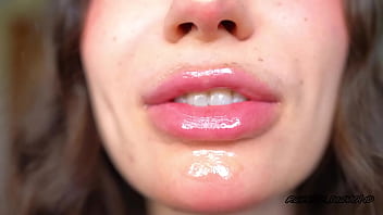 Wet messy lipgloss layers and pouting kisses