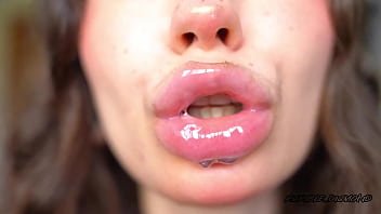 Wet messy lipgloss layers and pouting kisses