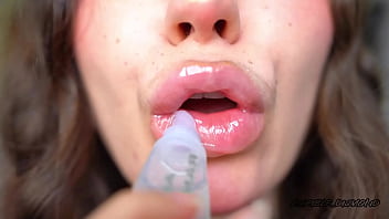 Wet messy lipgloss layers and pouting kisses