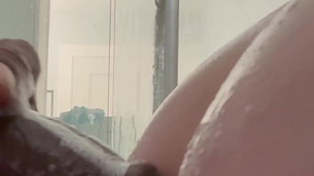 Caught playing with herself in the shower