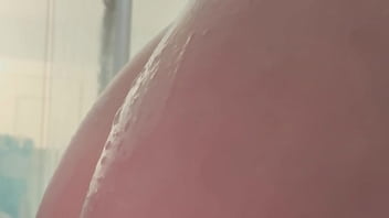 Caught playing with herself in the shower