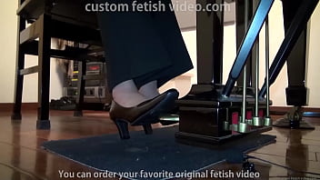 Grand piano pedal pumping in suit