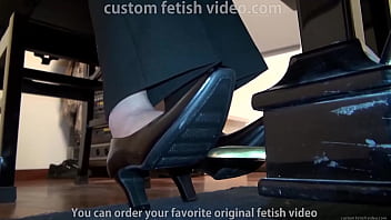 Grand piano pedal pumping in suit