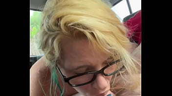 Pretty streetwalker in nude while giving a blowjob in the backseat of a car and takes a load in her mouth