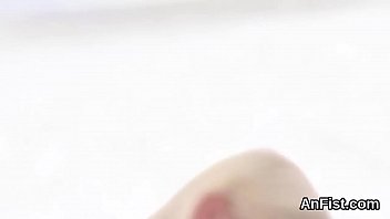 Lesbian sweetie gets her trimmed honey pot and anal hole fisted