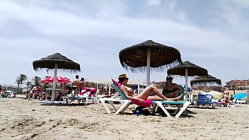 Brunette with huge tits on the beach part 2