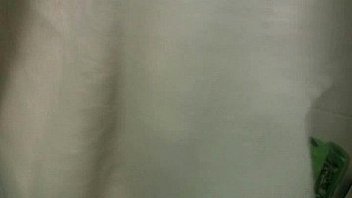 Latina girl wash her body in bathtub