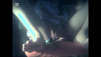 The camera under the table captured a beautiful woman at home alone and watching a porn movie