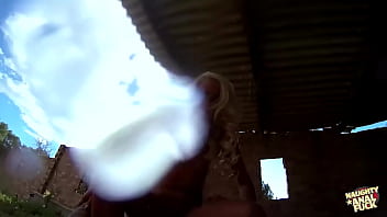 The man engaged in sexual intercourse with a promiscuous individual anally in an outdoor setting inside a dilapidated structure