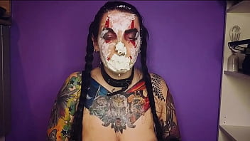 Sexy horny clown girl with a perfect ass has naughty fun with whipped cream at her kitchen