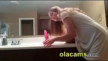 Amazing teen ride a dildo on bathroom