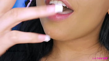 Alluring brunette model naked close up