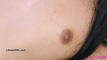 Alluring brunette model naked close up