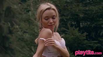 Slender blonde russian cougar reveals her sexy naked figure outside