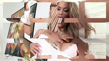 Cramming herself with a glass dildo