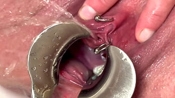 Strong stream pee from my spread out pussy by speculum