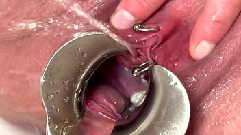 Strong stream pee from my spread out pussy by speculum