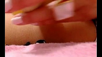 This girl not shows her face but puts a dildo in her pussy