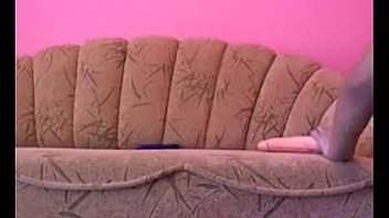 Busty beauty enjoying an adult toy