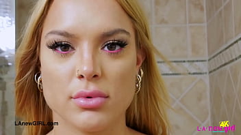 Charming blonde model enjoys a sensual bath