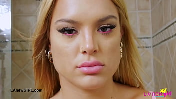 Charming blonde model enjoys a sensual bath