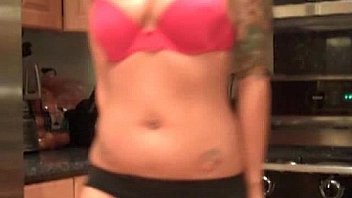 Sexy stripteasing emo in the kitchen