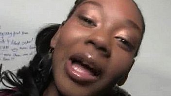 Interracial fun through a gloryhole Interracial fun through a gloryhole