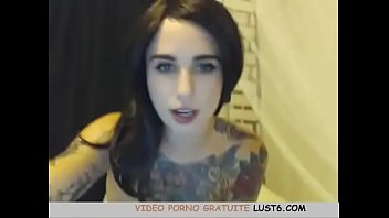 Hot tattooed brunette masturbates on cam