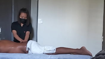 Spa girl massaging boy