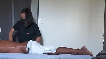 Spa girl massaging boy