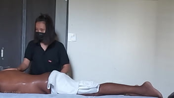 Spa girl massaging boy