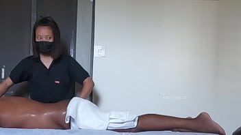 Spa girl massaging boy