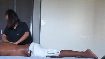 Spa girl massaging boy