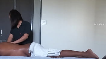 Spa girl massaging boy
